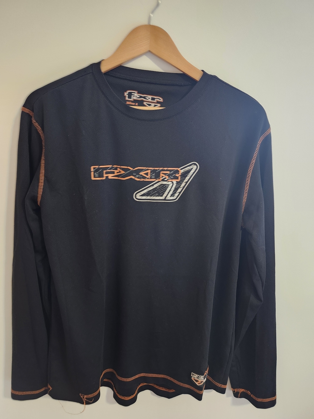 FXR Men’s Long Sleeve Black Performance Tee with Orange Accents